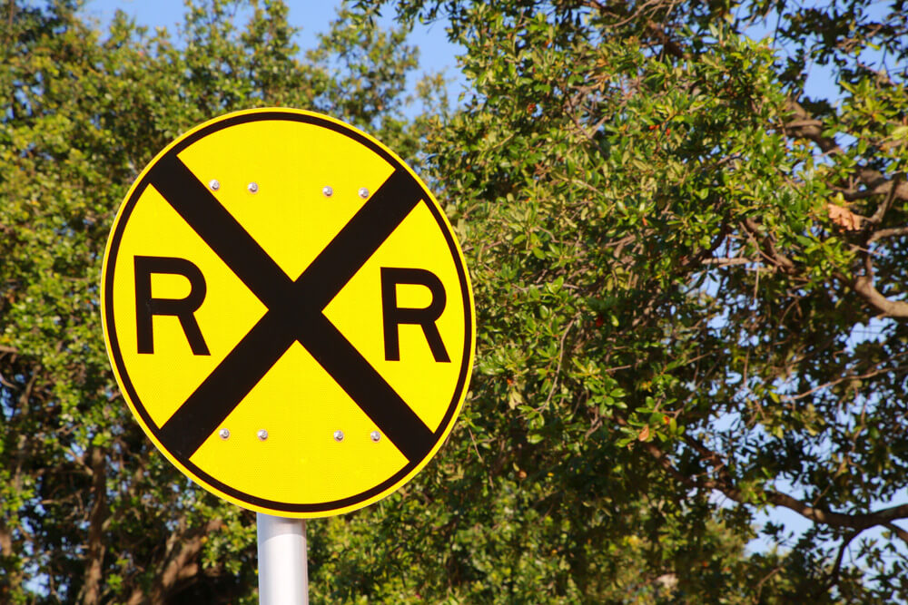 What Does The White Railroad Crossing Sign Mean