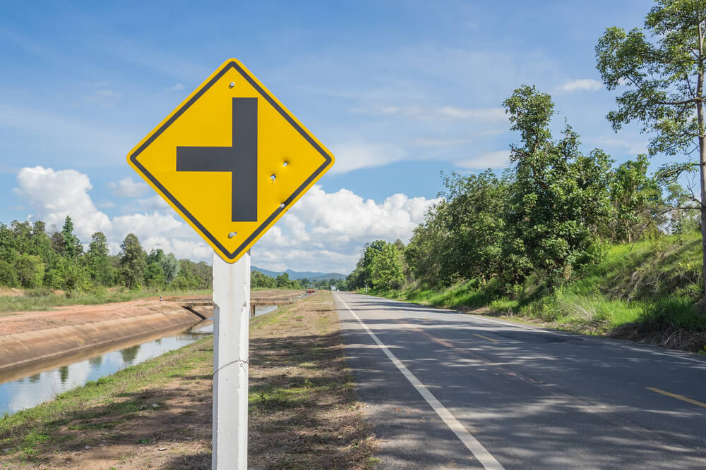 big signs on the side of the road