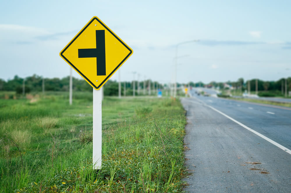 can you put signs on the side of the road